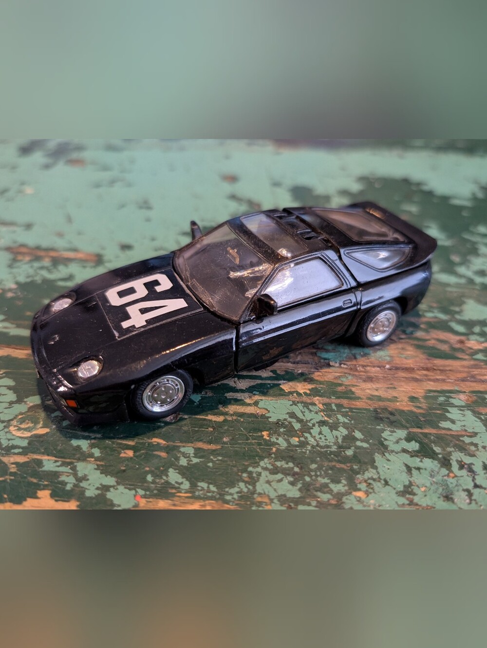 Vtg 1983 Bandai (popy). Super GoBots Herr Fiend Transformer Black Porsche 928S